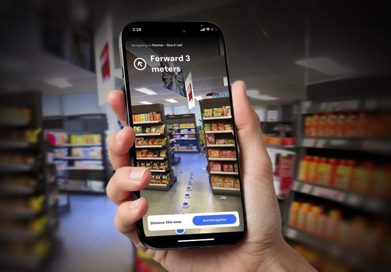 A hand holding a smartphone in a grocery store aisle, displaying an augmented reality navigation interface with blue markers on the floor and the text “Forward 3 meters,” guiding the user toward a specific product area.